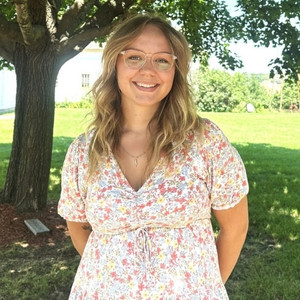 vet staff holding a kitten